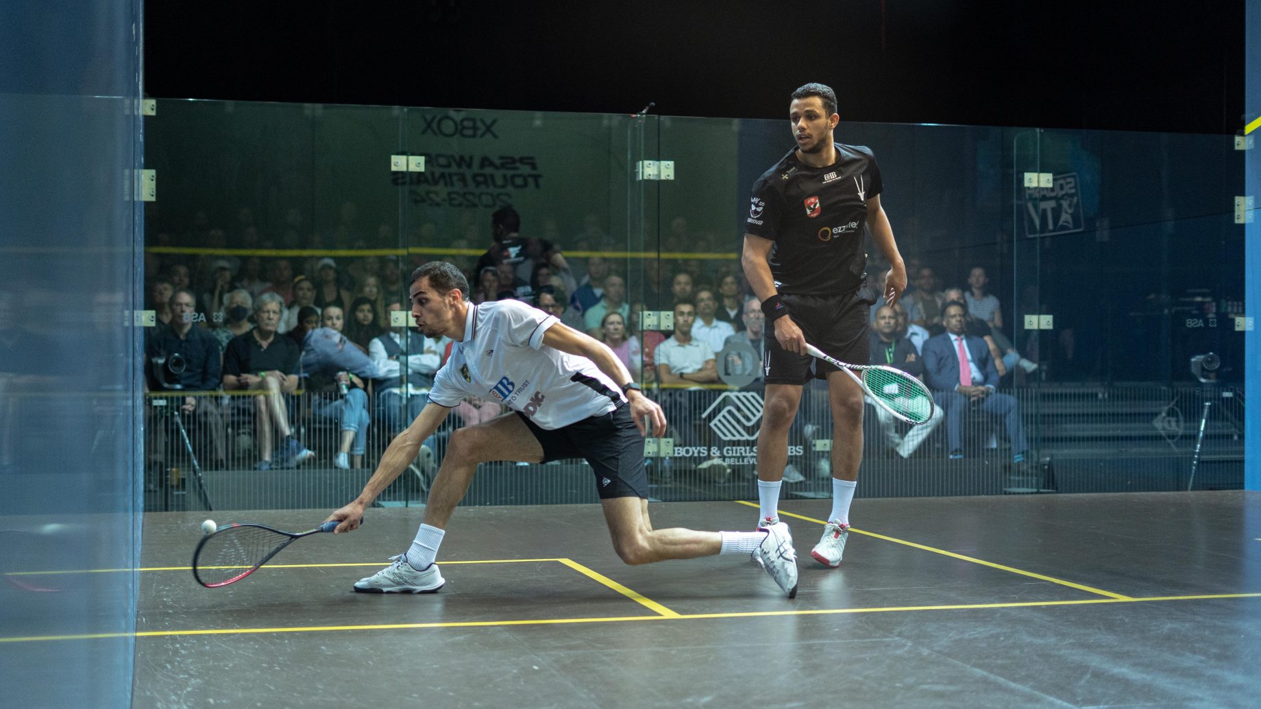 Ali Farag (left) takes on Mostafa Asal