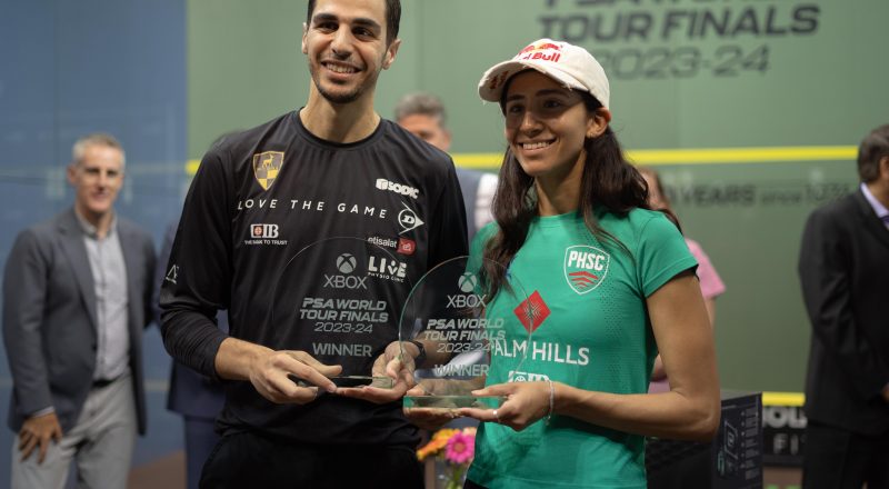 Ali Farag (left) and Nouran Gohar (right) with the trophies.